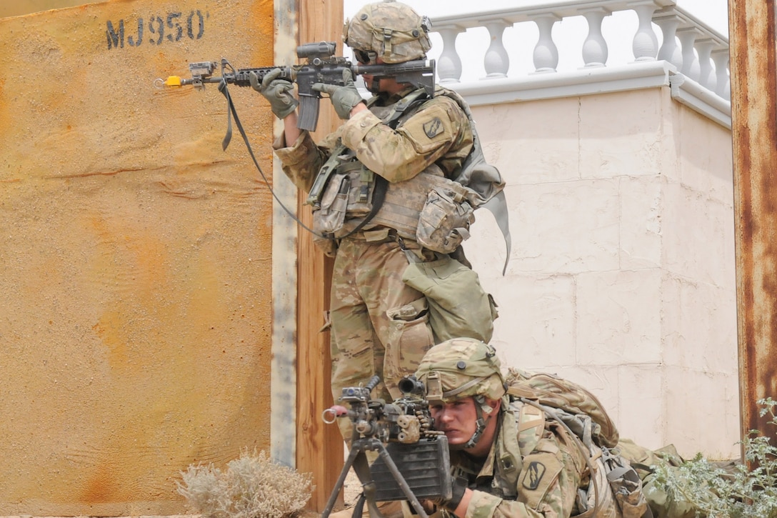 Soldiers assigned to the 155th Armored Brigade Combat Team, Mississippi Army National Guard maintain a defensive position during an attack on an enemy-held area during an exercise at the National Training Center, Fort Irwin, Calif., May 30, 2017. Mississippi National Guard photo by Army Staff Sgt. Veronica McNabb