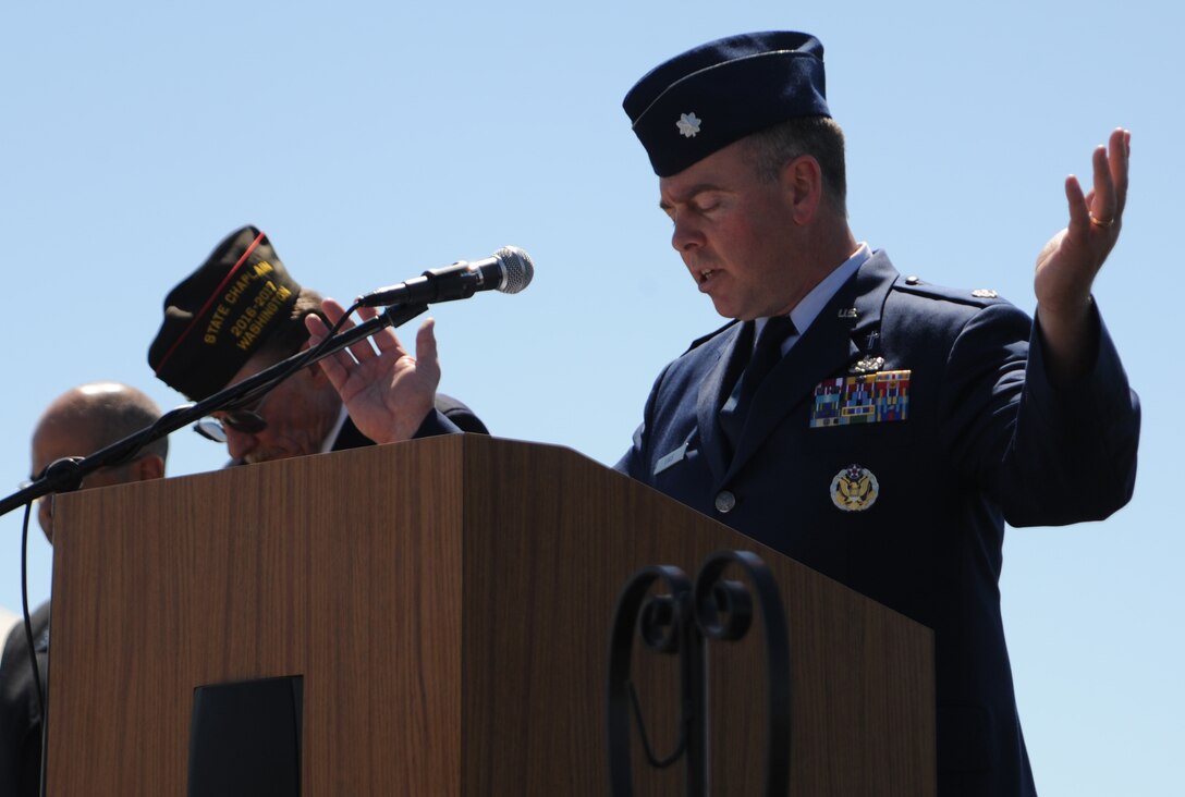 Chaplain (Maj.) Luce performs the invocation during a Memorial Day ceremony at Washington State Veterans Cemetery May 29, 2017. The ceremony honored service members who have lost their lives. Luce is from the 141st Air Refueling Wing, Fairchild Air Force Base, Washington. (U.S. Air Force photo by Master Sgt. J.G. Buzanowski)