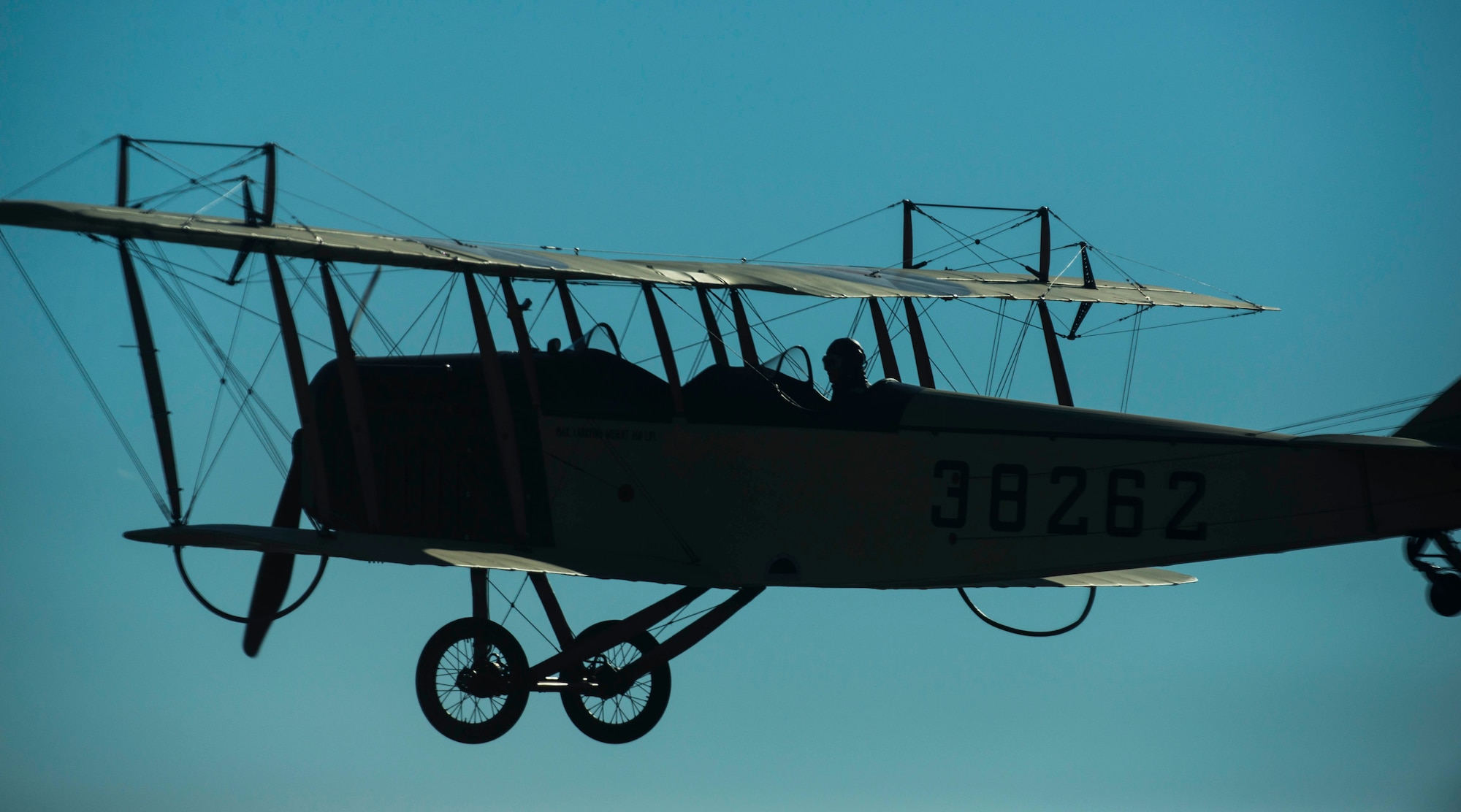 Dorian Walker, Chairman of Friends of Jenny, flies the JN-4 Jenny, May, 4, 2017 at Bowling Green, Kentucky. The Curtiss JN-4 along with Scott Air Force Base, Illinois, are celebrating a century of service. The Jenny is scheduled to perform at the Scott AFB Centennial Air Show and will also be on display for spectators to view the aircraft. (U.S. Air Force photo/Senior Airman Tristin English)