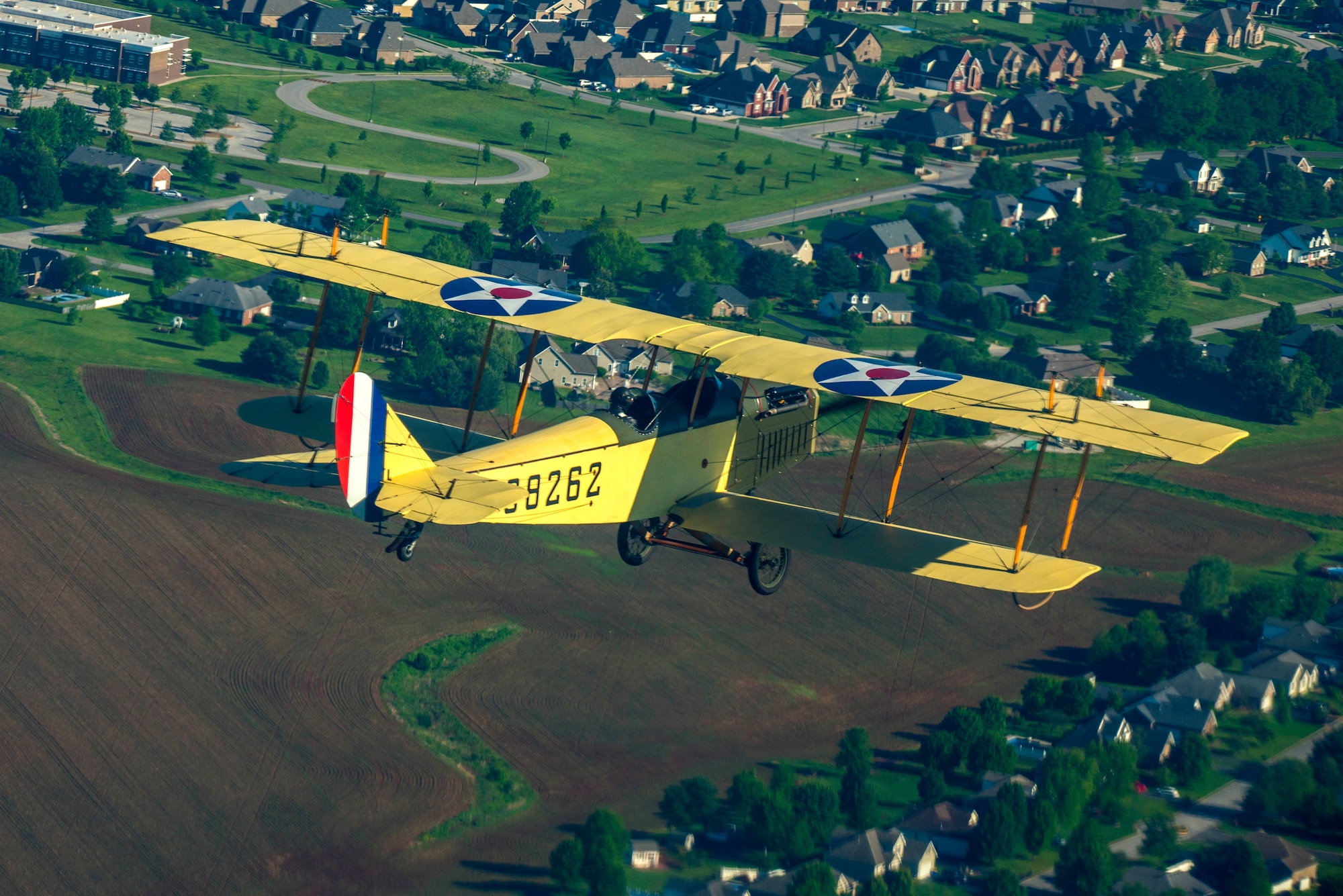 Dorian Walker, Chairman of Friends of Jenny, flies the JN-4 Jenny, May, 4, 2017 at Bowling Green, Kentucky. The Curtiss JN-4 is possibly North America's most famous World War I aircraft. It was a twin-seat, student in front of instructor, dual-control biplane. Its tractor propeller and maneuverability made it ideal for initial pilot training. It was widely used during World War I to train begining pilots, with an estimated 95% of all trainees having flown a JN-4. (U.S. Air Force photo/Senior Airman Tristin English)