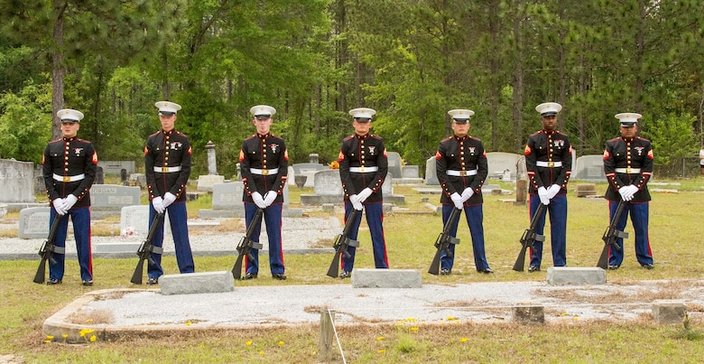 The honor guard team with Marine Corps Logistics Base Albany funeral detail prepares to fire three volleys from their rifles in honor of Marine Pfc. James O. Whitehurst at Cowarts Baptist Church Cemetery in Cowarts, Alabama, April 12, 2017.This tradition comes from tradition battle ceasefires where each side would clear the dead. The firing of three volleys indicated the dead were cleared and properly cared for. Whitehurst was killed in action at the battle of Tarawa during World War II, Nov. 23, 1943. (Marine Corps photo by Cpl. Krista James/Released)