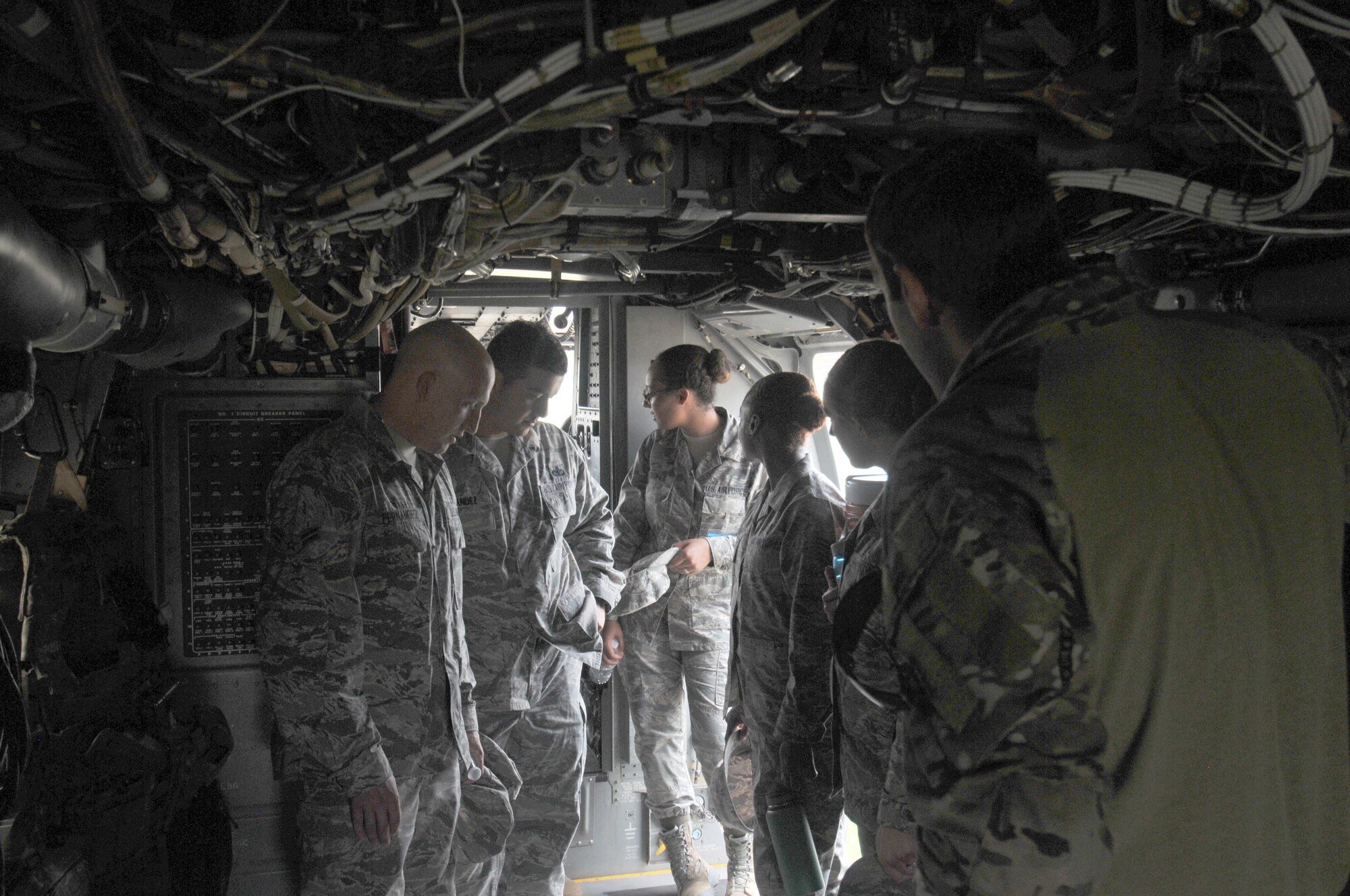 17th Training Wing students study the inside of a CV-22 Osprey on Goodfellow Air Force Base, Texas, May 30, 2017. The visit gave students a hands-on experience, allowing them to have a bigger picture of their job in the operational Air Force. (U.S. Air Force photo by Airman 1st Class Randall Moose/Released) 