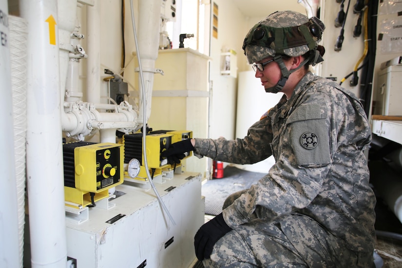 Pfc. Makayla Black with the 810th Quartermaster Company of Cincinnati, Ohio, works on a Reverse-Osmosis Water Purification Unit at Big Sandy Lake on May 10, 2017, during operations for the 86th Training Division’s Warrior Exercise 86-17-02 at Fort McCoy, Wis. The Warrior Exercise provides unique training opportunities for various Soldiers in various military occupation specialties to train together on simulated combat missions and to work together as a team, just like they would in a real-world environment. The 810th provided the majority of the drinkable water used in the exercise through water-purification efforts. (U.S. Army Photo by Scott T. Sturkol, Public Affairs Office, Fort McCoy, Wis.)