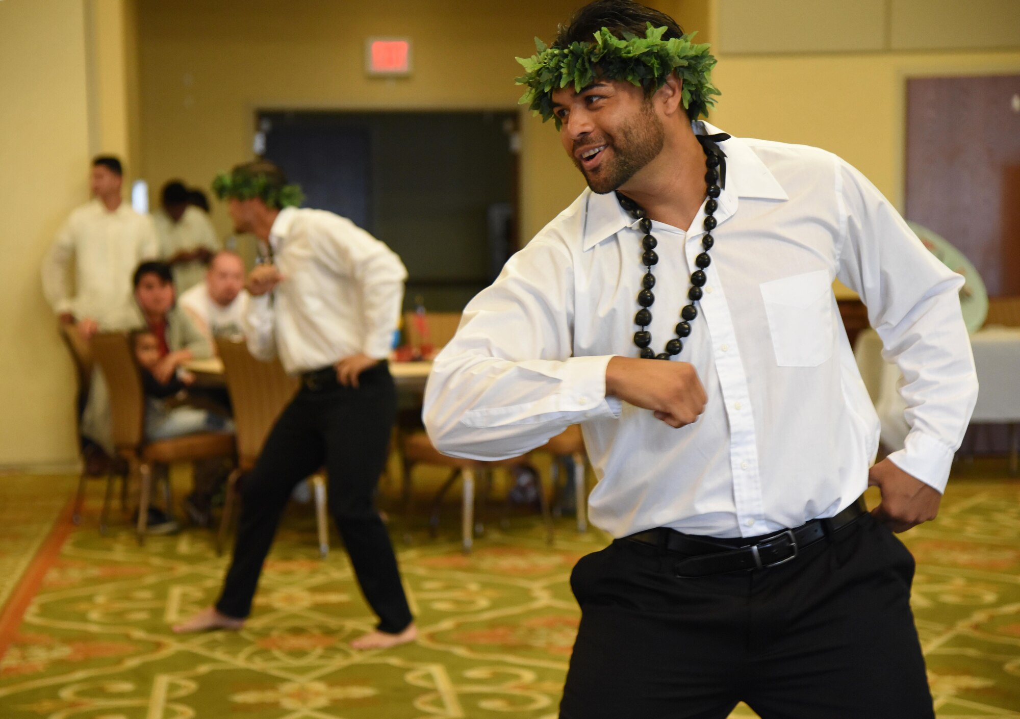 Tech. Sgt. Justin King, 81st Infrastructure Division firefighter, performs a Western-influenced dance during the Asian American and Pacific Islander heritage event at the Bay Breeze Event Center May 24, 2017, on Keesler Air Force Base, Miss. The event, held in recognition of AAPI Heritage Month, displayed various traditional foods for sampling from several Asian and Pacific Islands, as well as karate and dance demonstrations. (U.S. Air Force photo by Kemberly Groue)
