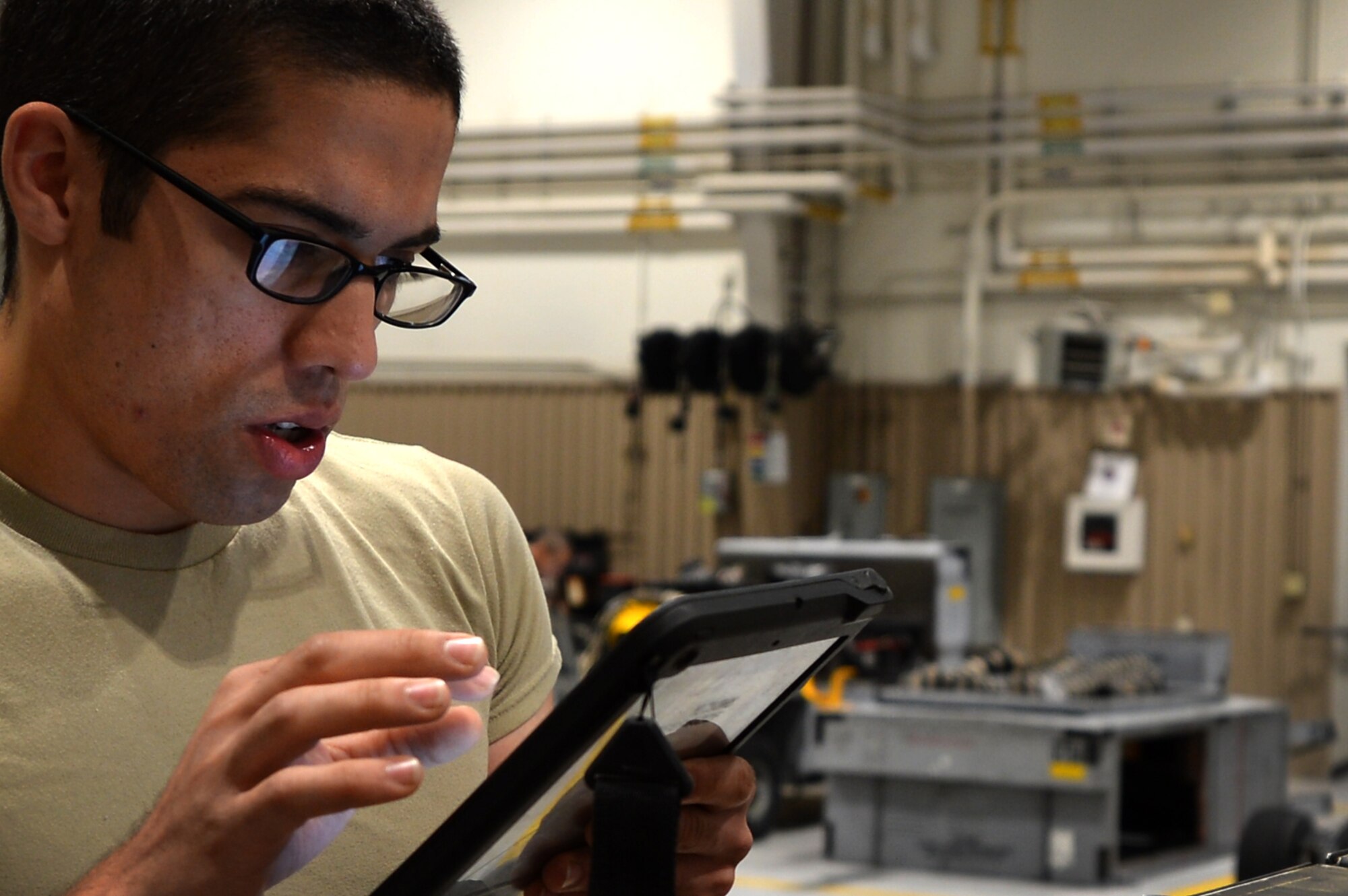 U.S. Air Force Staff Sgt. Michael Maldonado, 20th Equipment Maintenance Squadron aerospace ground equipment journeyman, reviews a technical order (TO) at Shaw Air Force Base, S.C., May 24, 2017. Maldonado reviewed the TO before performing maintenance on the generator to ensure all procedures were in accordance with safety guidelines. (U.S. Air Force photo by Airman 1st Class Christopher Maldonado)
