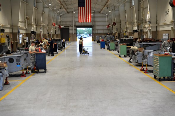 U.S. Airmen assigned to the 20th Equipment Maintenance Squadron aerospace ground equipment (AGE) flight perform their duties at Shaw Air Force Base, S.C., May 24, 2017. The AGE flight inspects and repairs all equipment entering the work center to include generators, bomb loaders and other pieces of equipment needed to complete flightline operations. (U.S. Air Force photo by Airman 1st Class Christopher Maldonado)