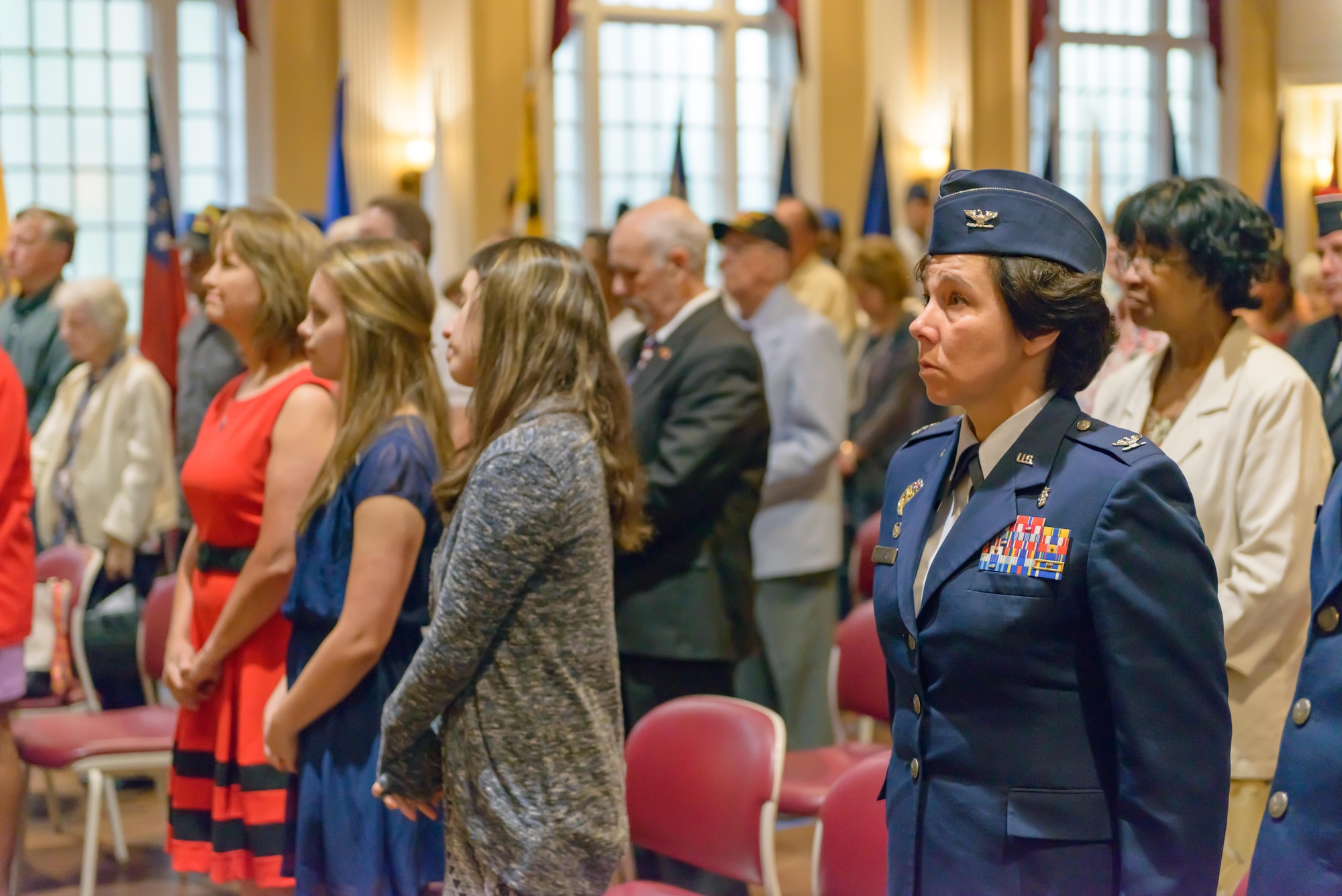 Col. Jeannine Ryder, 81st Medical Group commander, listens as names of deceased veterans are read during the Memorial Day Ceremony at the Biloxi National Cemetery May 29, 2017, Biloxi, Miss. The ceremony paid homage to those who have made the ultimate sacrifice while serving in the armed forces. (U.S. Air Force photo by Andre’ Askew)

