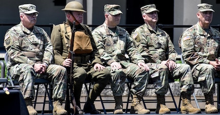 Members of the official party watch as members of the Iowa National Guard conduct Retreat at Camp Dodge, Iowa on May 25. Maj. Gen. Patrick Reinert, 88th RSC commanding general, and Command Sergeant Major Earl Rocca, 88th RSC command sergeant major, attended the Iowa National Guard Command Retreat hosted by Maj. Gen. Timothy Orr, Adjutant General of the Iowa National Guard, and dedicated the plaque in honor of the Blue Devil's 100 years of serving our Nation.