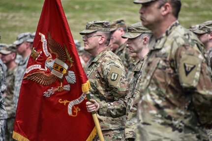 Members of the Iowa National Guard stand at parade rest while conducting Retreat as the 88th Regional Support Command dedicates a plaque at Camp Dodge, Iowa on May 25, in honor of the 88th Infantry Division's beginning there in 1917. During the Command Retreat, Airmen, Soldiers, and Civilians are recognized by Maj. Gen. Timothy Orr, Adjutant General of the Iowa National Guard, for their contributions to the Guard and their communities, state and nation.