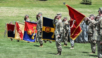 Members of the Iowa National Guard conduct Retreat as the 88th Regional Support Command dedicates a plaque at Camp Dodge, Iowa on May 25, in honor of the 88th Infantry Division's beginning there in 1917. During the Command Retreat, Airmen, Soldiers, and Civilians are recognized by Maj. Gen. Timothy Orr, Adjutant General of the Iowa National Guard, for their contributions to the Guard and their communities, state and nation.