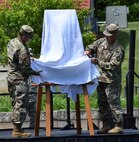 The 88th Regional Support Command unveils a plaque at Camp Dodge, Iowa on May 25, in honor of the 88th Infantry Division's beginning there in 1917. Maj. Gen. Patrick Reinert, 88th RSC commanding general (left), attended the Iowa National Guard Command Retreat hosted by Maj. Gen. Timothy Orr, Adjutant General of the Iowa National Guard (right), and dedicated the plaque in honor of the Blue Devil's 100 years of serving our Nation.