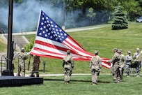 Members of the Iowa National Guard lower the flag while conducting Retreat as the 88th Regional Support Command dedicates a plaque at Camp Dodge, Iowa on May 25, in honor of the 88th Infantry Division's beginning there in 1917. During the Command Retreat, Airmen, Soldiers, and Civilians are recognized by Maj. Gen. Timothy Orr, Adjutant General of the Iowa National Guard, for their contributions to the Guard and their communities, state and nation.