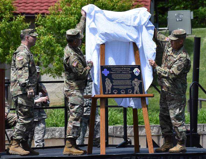 The 88th Regional Support Command unveils a plaque at Camp Dodge, Iowa on May 25, in honor of the 88th Infantry Division's beginning there in 1917. Maj. Gen. Patrick Reinert, 88th RSC commanding general (center), Command Sergeant Major Earl Rocca, 88th RSC command sergeant major (left), attended the Iowa National Guard Command Retreat hosted by Maj. Gen. Timothy Orr, Adjutant General of the Iowa National Guard (right), and dedicated the plaque in honor of the Blue Devil's 100 years of serving our Nation.