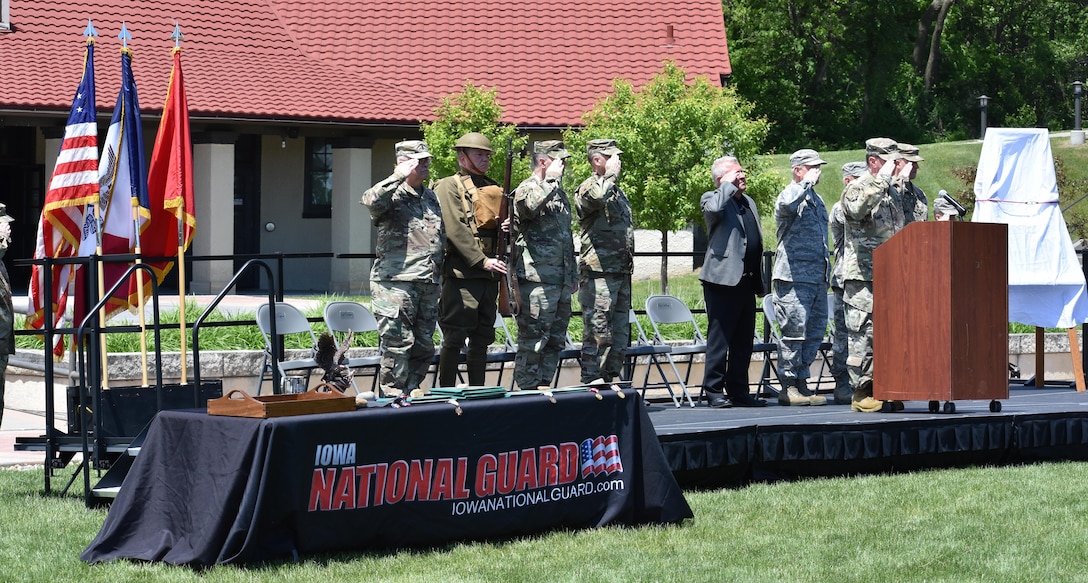 The 88th Regional Support Command salutes during a ceremony to dedicate a plaque at Camp Dodge, Iowa on May 25, in honor of the 88th Infantry Division's beginning there in 1917. Maj. Gen. Patrick Reinert, 88th RSC commanding general, and Command Sergeant Major Earl Rocca, 88th RSC command sergeant major, attended the Iowa National Guard Command Retreat hosted by Maj. Gen. Timothy Orr, Adjutant General of the Iowa National Guard, and dedicated the plaque in honor of the Blue Devil's 100 years of serving our Nation.