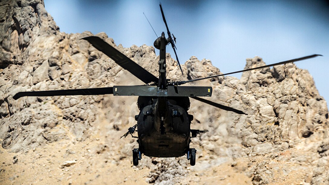 Army pilots fly a UH-60 Black Hawk helicopter on a mission from an undisclosed location near Kandahar Airfield, Afghanistan, May 27, 2017. Army photo by Capt. Brian Harris