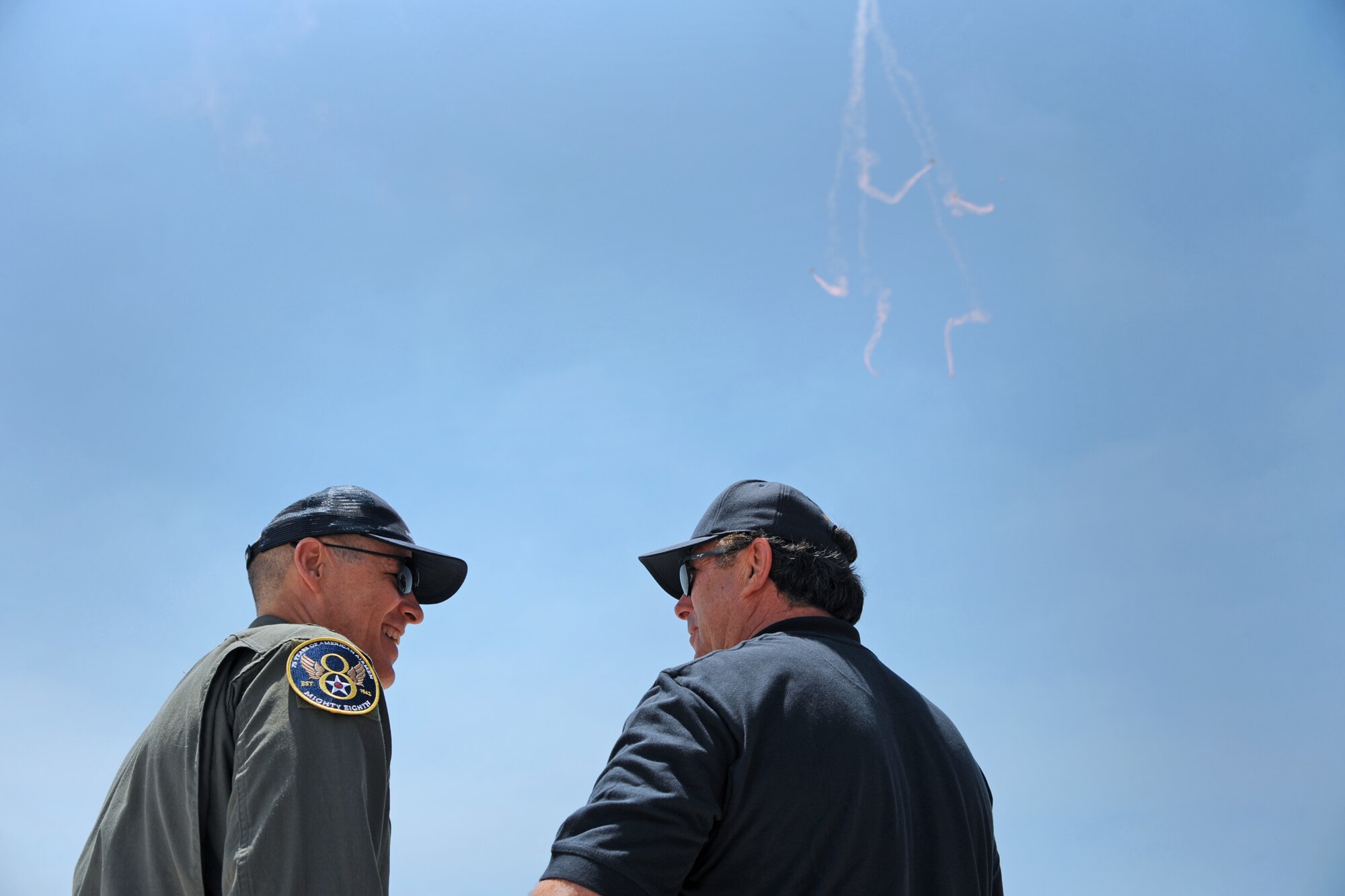 Maj. Gen. Thomas Bussiere, Eighth Air Force commander, left, attends the Salute to America’s Heroes Air and Sea Show in Miami Beach, Fla., May 28, 2017. The weekend-long airshow allowed U.S. service member participants to demonstrate military technology and capabilities, while also educating the public about various aspects of the U.S. military. (U.S. Air Force photo by Senior Airman Erin Trower)