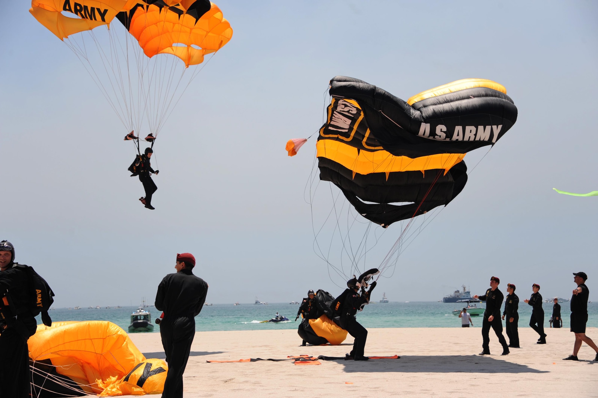 Members of the U.S. Army Golden Knights Parachute Team land after a demonstration during the Salute to America’s Heroes Air and Sea Show in Miami Beach, Fla., May 28, 2017. Members representing all branches of the U.S. Armed Forces took part in the Memorial Day weekend airshow to increase public awareness and understanding of each branch’s unique mission and capabilities. (U.S. Air Force photo by Senior Airman Erin Trower)