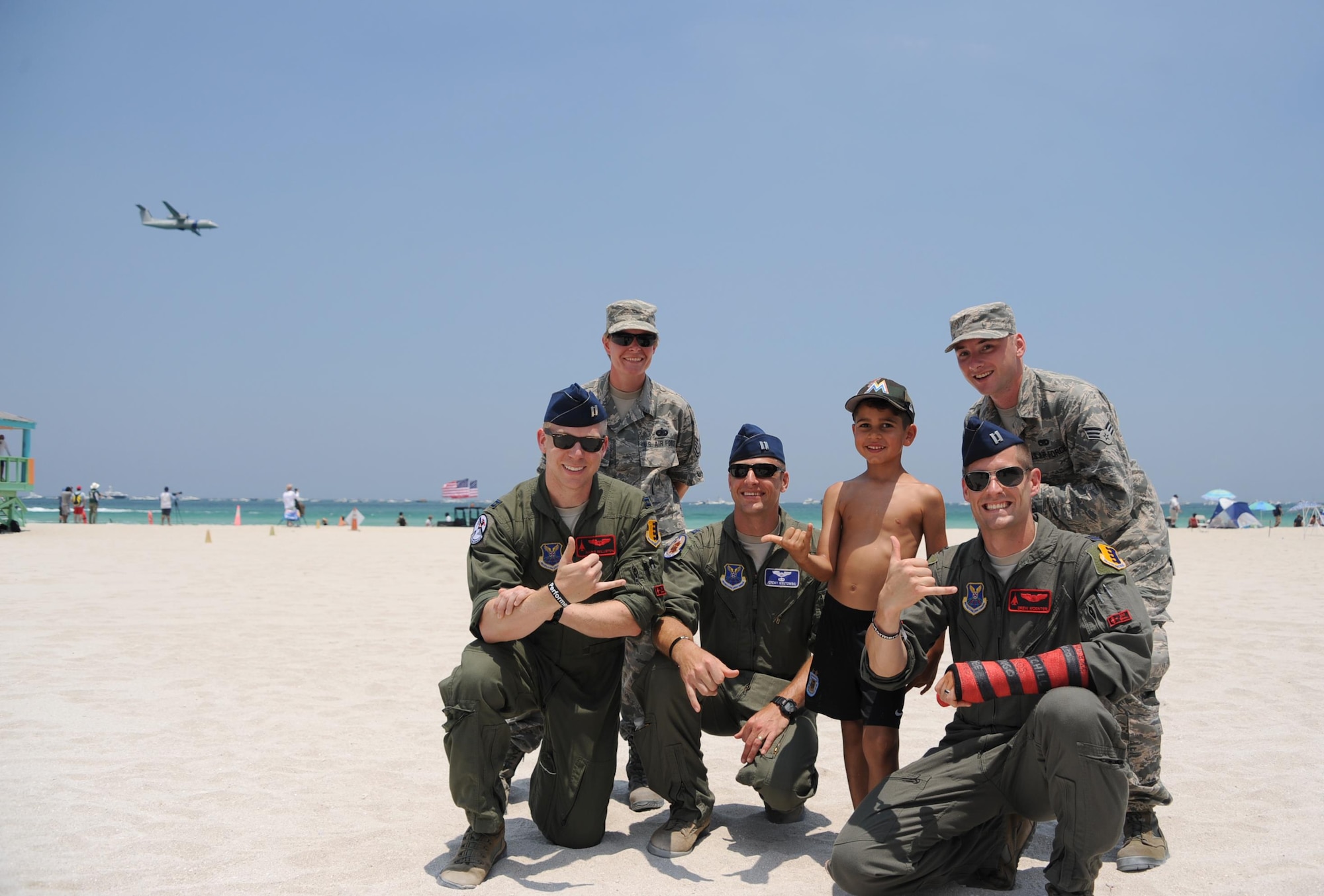 U.S. Air Force service members attend the Salute to America’s Heroes Air and Sea Show in Miami Beach, Fla., May 28, 2017, to interact with the local public, educate and build community relations. Eighth Air Force bomber aircraft performed flyovers to provide the public with a capability display. (U.S. Air Force photo by Senior Airman Erin Trower)