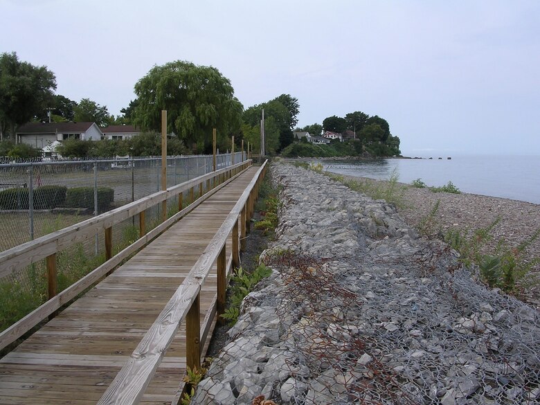 Facing west, the location is Lake Ontario shoreline, just west of the Olcott Harbor West Pier. Gabions were installed as part of Operation Foresight around 1973 or 1974. Photo was taken on Sept. 10, 2007. 

