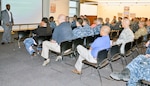 D. Calvin Jackson, a retired Army master sergeant biomedical equipment technician, or BMET, speaks to staff, students and instructors from the Medical Education and Training Campus, or METC, at Joint Base San Antonio-Fort Sam Houston as part of Healthcare Technology Management Week. METC instructors from the tri-service biomedical equipment technician, or BMET, program planned daily events to raise awareness during the week.