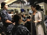 Ramani Fernando, right, owner of a hair salon in Colombo, talks to Sailors donating hair to make wigs for cancer patients in Sri Lanka. The Sailors are assigned to Ticonderoga-class guided-missile cruiser USS Princeton (CG 59), part of the Nimitz Carrier Strike Group (CSG). Nimitz CSG is on a regularly scheduled deployment in the 7th Fleet area of responsibility in support of maritime security operations and theater security cooperation efforts.