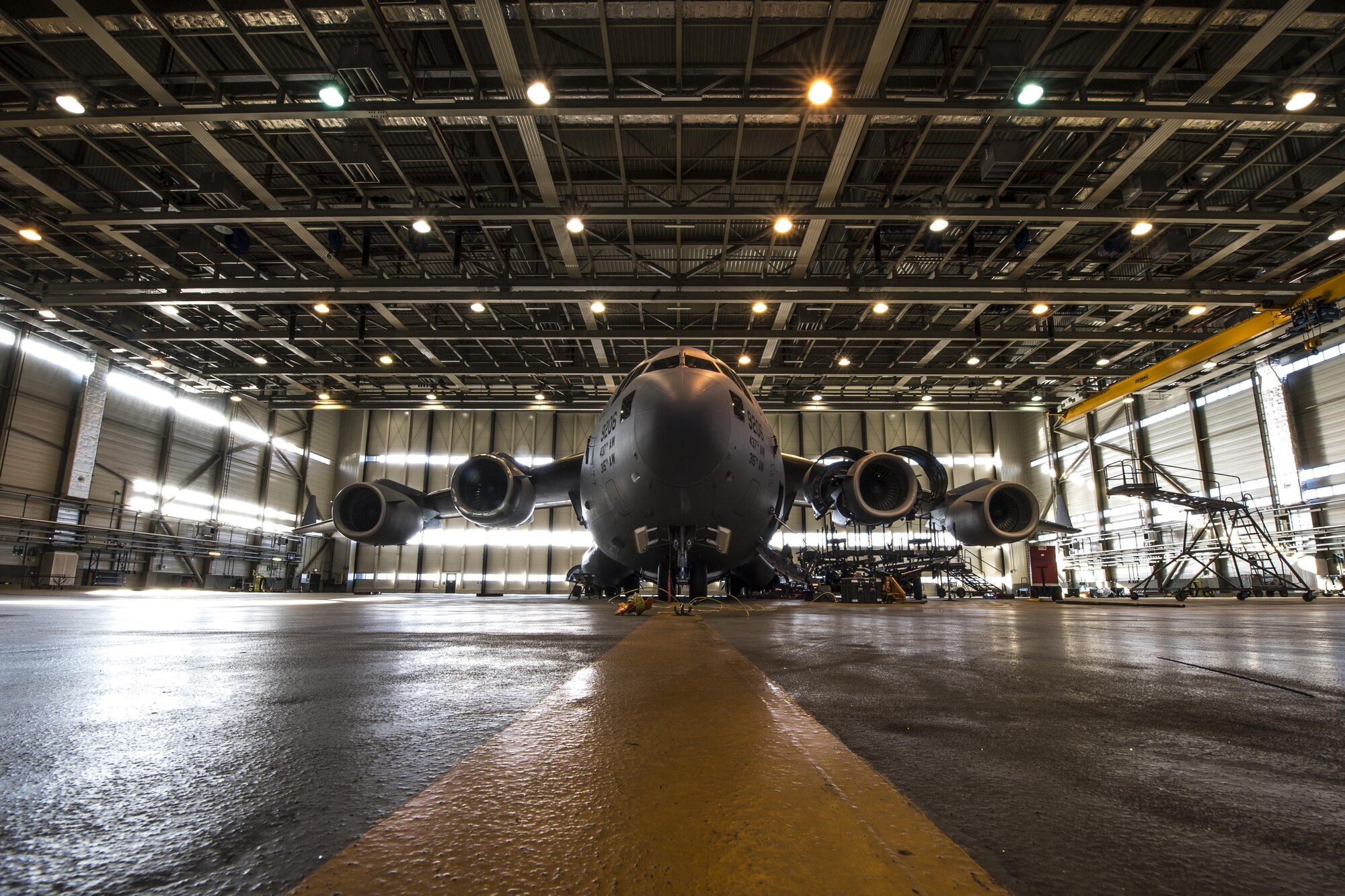 A U.S. Air Force C-17 Globemaster III assigned to the 437th Airlift Wing at Joint Base Charleston, South Carolina, sits in a hangar on Ramstein Air Base, Germany, Oct. 27, 2017. Airmen assigned to the 721st Aircraft Maintenance Squadron removed a damaged engine from the aircraft and replaced it with a new one. (U.S. Air Force photo by Senior Airman Devin Boyer)