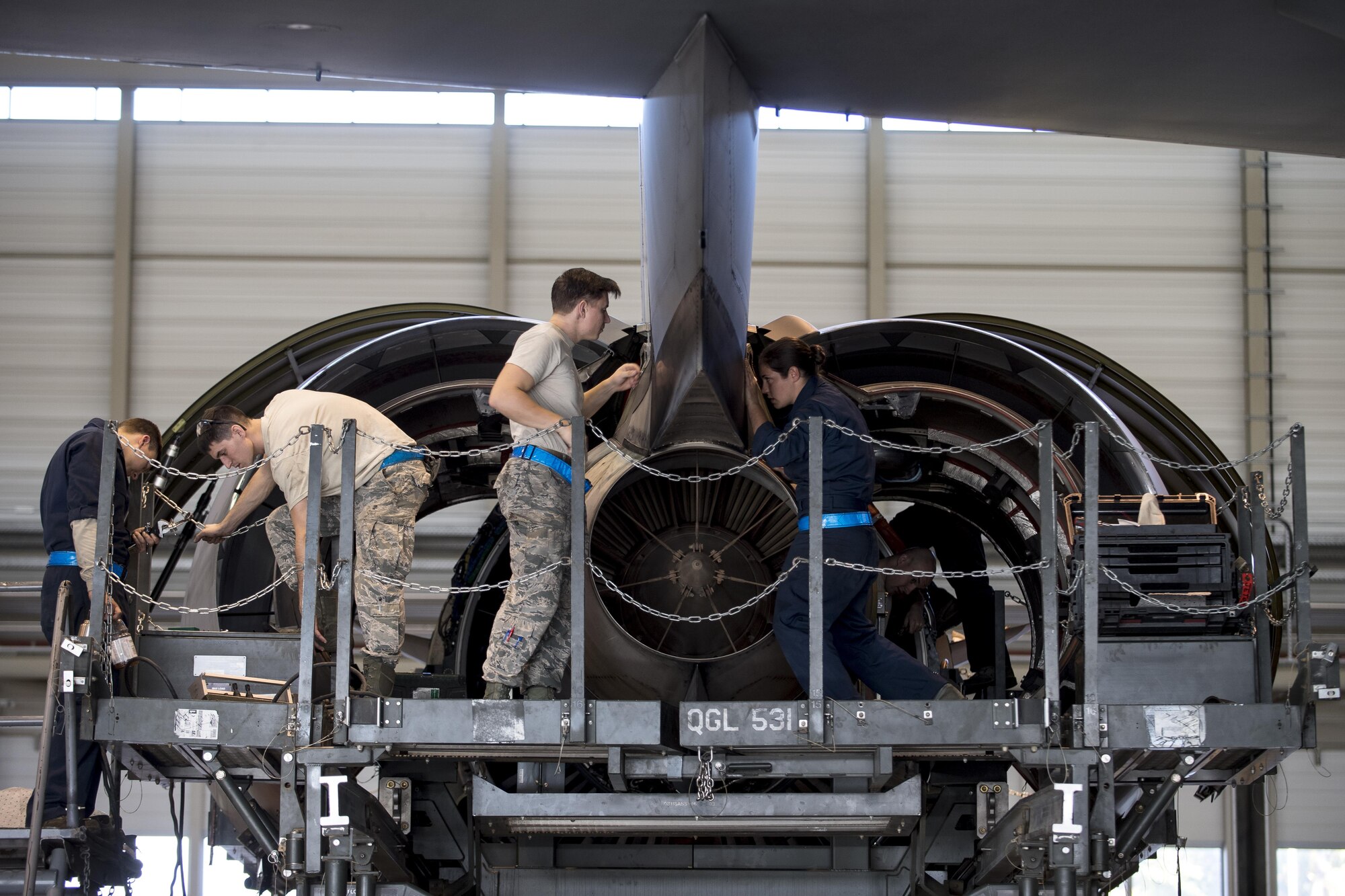 U.S. Air Force Airmen assigned to the 721st Aircraft Maintenance Squadron prepare a C-17 Globemaster III engine for removal at a hangar on Ramstein Air Base, Germany, Oct. 27, 2017. After removing the faulty engine, the maintainers lift the new engine in its place and bolt it to the aircraft. The faulty engine then gets sent to a facility where technicians diagnose the issues it has and refurbish it so it is operable again. (U.S. Air Force photo by Senior Airman Devin Boyer)
