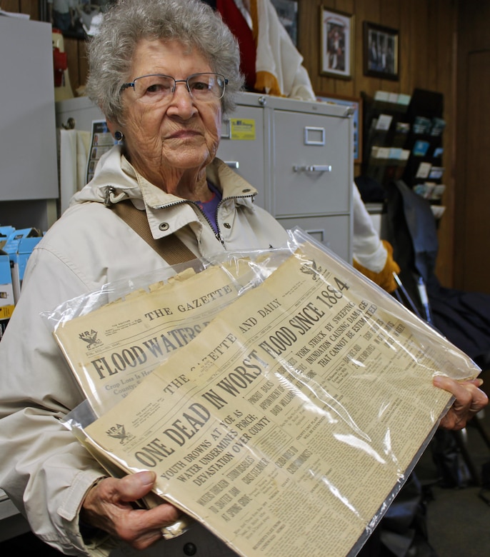 Erma Henry-Raver holds a copy of the York Gazette and Daily newspaper from the flood of 1933 that she brought with her to the 75th anniversary open house celebration of Indian Rock Dam in York, Pennsylvania Saturday October 28, 2017. The flood of 1933 was the primary reason Indian Rock Dam - completed in 1942 - was built.