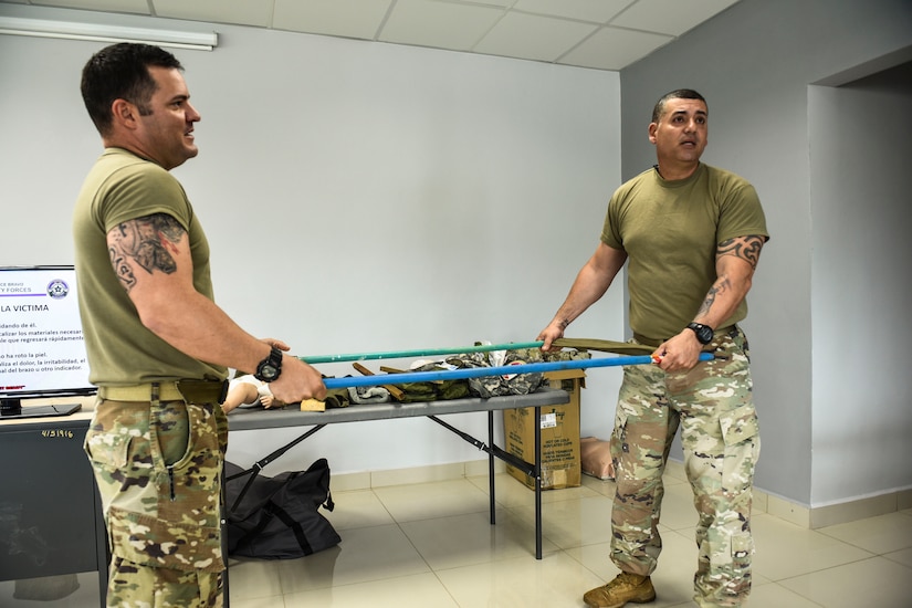 Joint Security Forces and local police forces participate in Subject Matter Expert Exchange to practice life saving techniques for emergency situations.