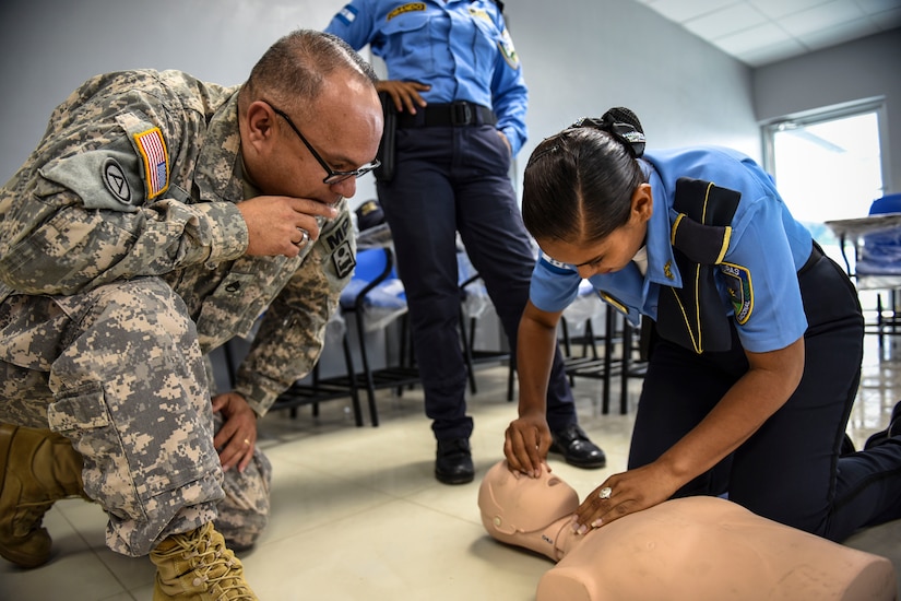 Joint Security Forces and local police forces participate in Subject Matter Expert Exchange to practice life saving techniques for emergency situations.