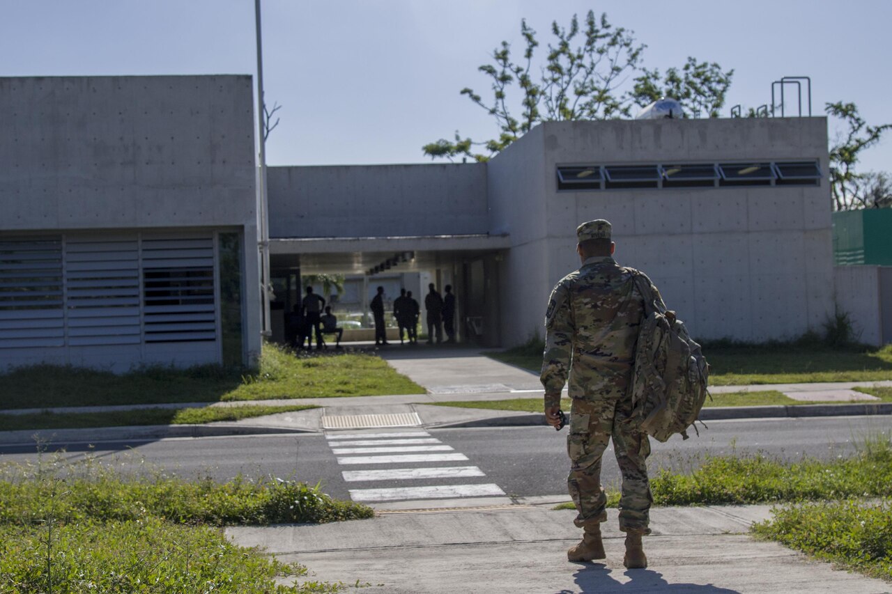 An Army ROTC instructor arrives on the University of Puerto Rico campus in San Juan, Puerto Rico.