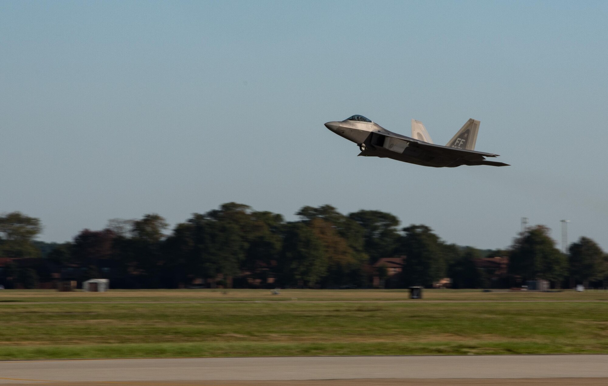 A U.S. Air Force F-22 Raptor assigned to the 1st Fighter Wing takes off during a training mission at Joint Base Langley-Eustis, Va., Oct. 31, 2017.