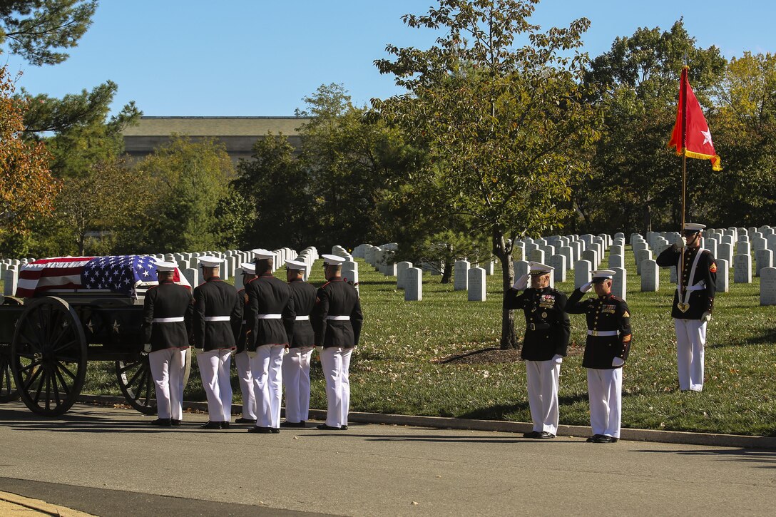 U.S. Marine Corps Body Bearers prepare to carry the casket of Maj. Gen. Terrence R. Murray to his final resting place during a full honors funeral at Arlington National Cemetery, Arlington, Va., Oct. 31. 2017. Marine Barracks Washington is home to the Marines who provide support for all Marine Corps funerals and many high-ranking government officials’ funerals within the National Capitol Region. (Official U.S. Marine Corps photo by Cpl. Damon Mclean/Released)