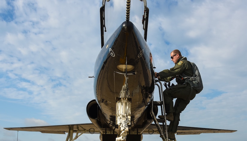 U.S. Air Force 1st Lt. Champ, 71st Fighter Training Squadron T-38 Talon pilot, boards an aircraft before flight at Joint Base Langley-Eustis, Va., Sept. 14, 2017.
