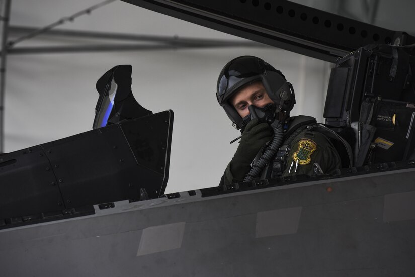 U.S. Air Force 1st Lt. Pen, 94th Fighter Squadron F-22 Raptor pilot, completes his preflight checklist before take-off at Joint Base Langley-Eustis, Va., Sept. 18, 2017.