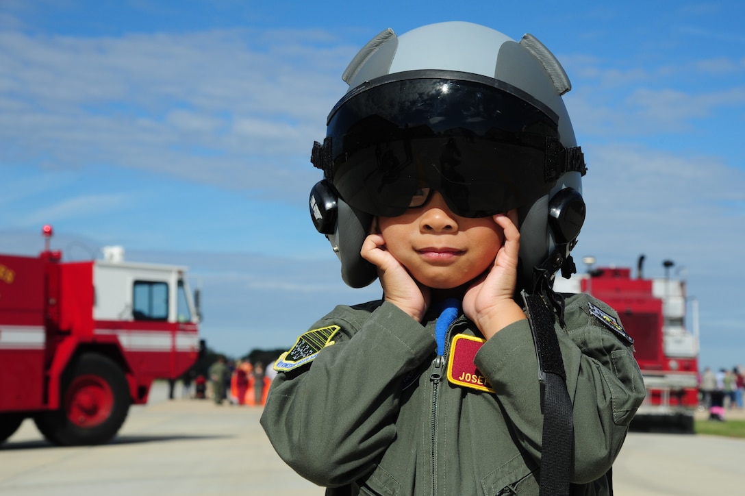 A “future aviator” covers his ears during a U.S. Air Force F-22 Raptor demonstration at the 1st Fighter Wing’s Centennial Celebration Fall Festival at Joint Base Langley-Eustis, Va., Oct. 28, 2017.