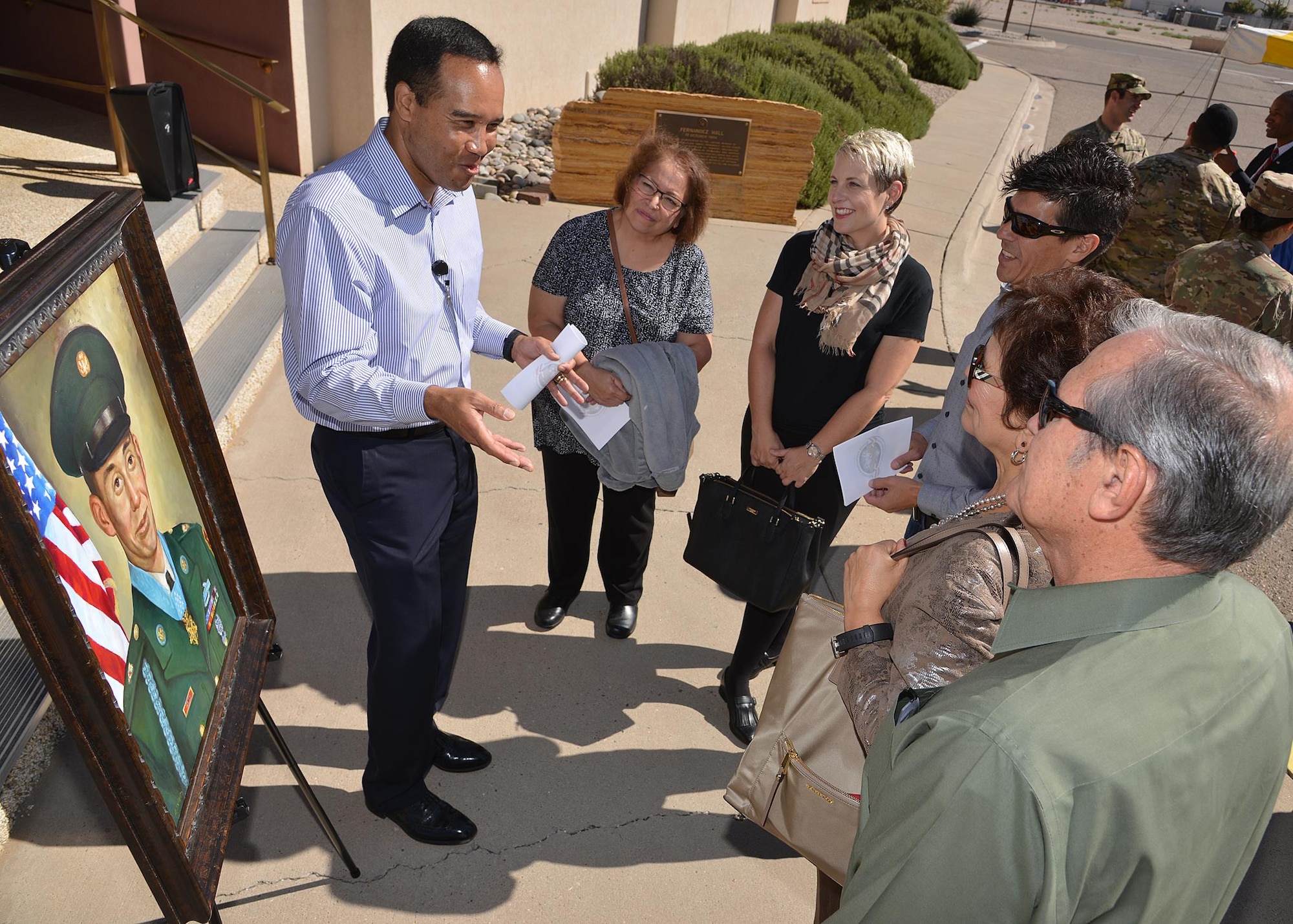 Paul S. Greenhouse, director of the National Assessment Group, speaks with attendees of the rededication ceremony of Fernandez Hall on Oct. 6. The hall is named for U.S. Army Spc. Daniel D. Fernandez, a Los Lunas Vietnam War hero.