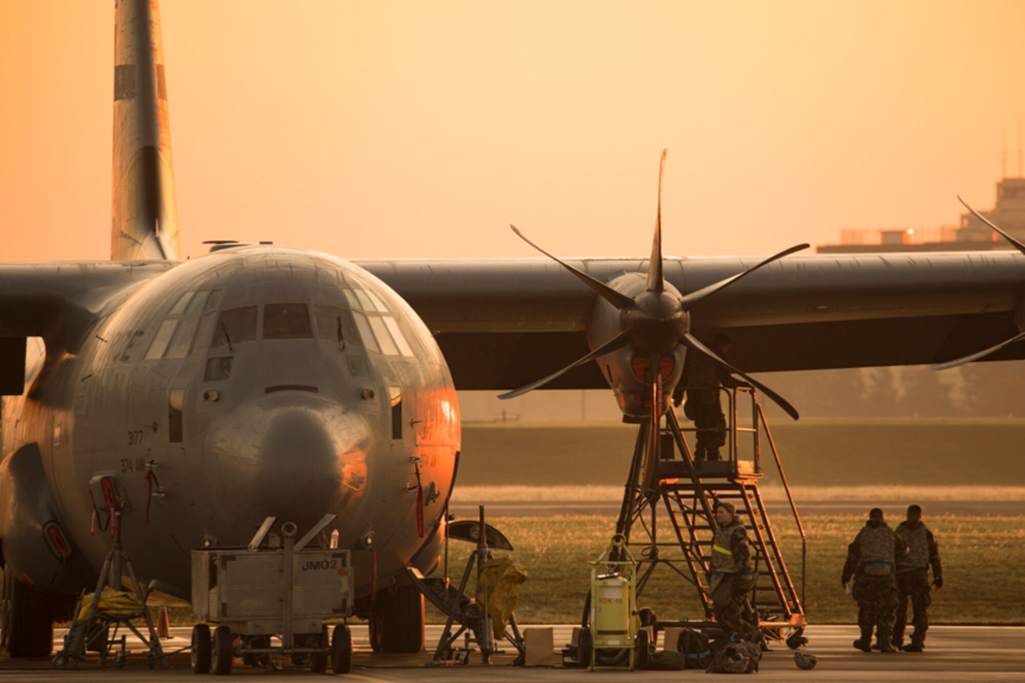 Crew chiefs assigned to the 374th Aircraft Maintenance Squadron maintain a C-130J Super Hercules during Exercise Beverly Morning 17-06 at Yokota Air Base, Japan, Oct. 26, 2017. Yokota received the C-130J from Dyess Air Force Base, Texas, and crew chiefs maintain the aircraft 24/7.