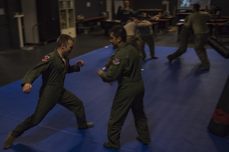 Airmen assigned to Moody Air Force Base practice skills learned in combat survival training, Oct. 23, 2017, at Moody Air Force Base, Ga. The new, three-day combined training is designed to merge many smaller courses and seamlessly tie together skills that could be used in the event that Airmen become isolated during a mission. (U.S. Air Force photo by Senior Airman Daniel Snider)