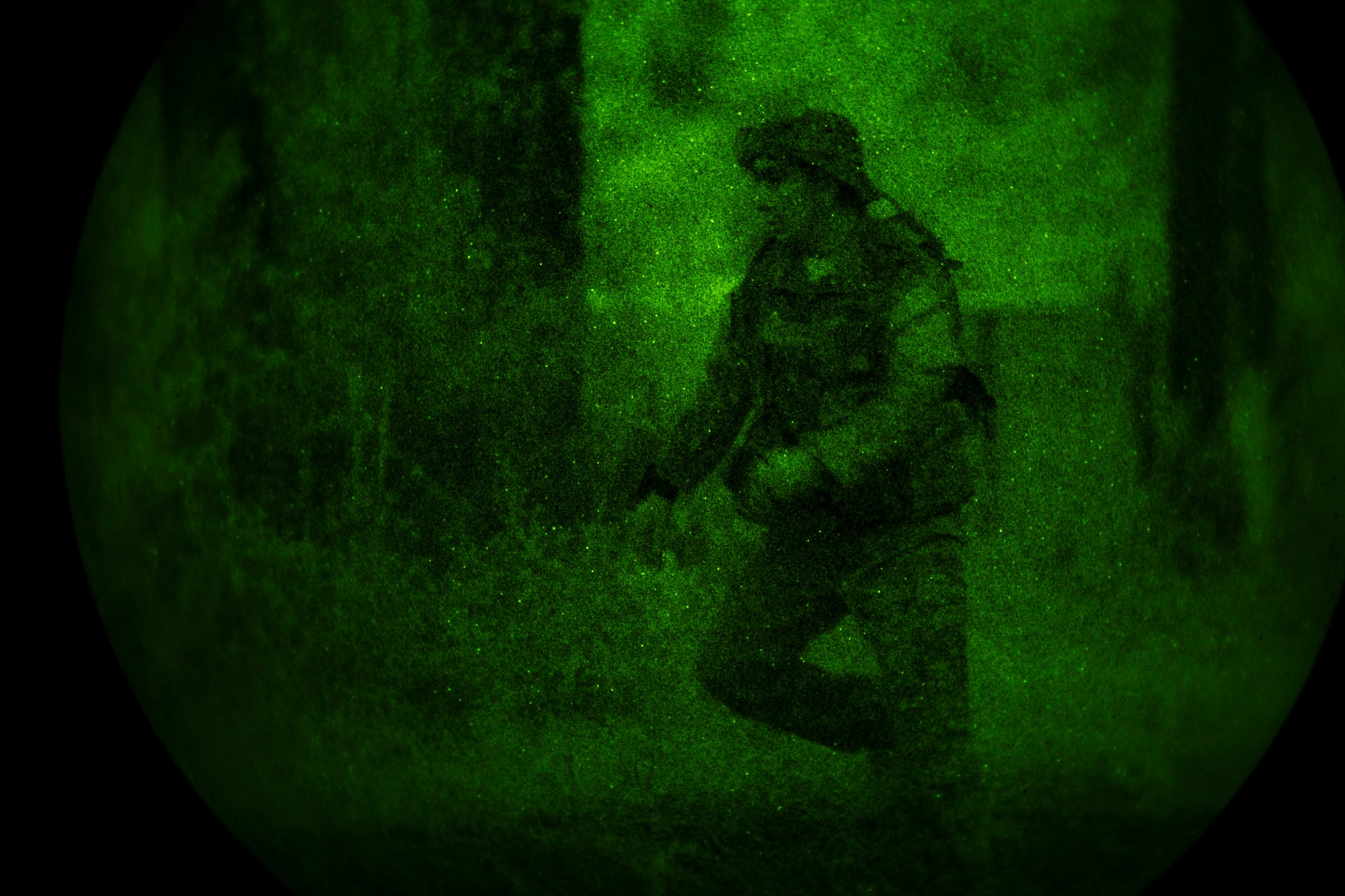 Staff Sgt. Edgar Elizalde, 347th Operations Support Squadron HC-130J Combat King II instructor loadmaster, runs to a checkpoint during nighttime evasion training, Oct. 24, 2017, at Moody Air Force Base, Ga. The new, three-day combined training is designed to merge many smaller courses and seamlessly tie together skills that could be used in the event that Airmen become isolated during a mission. (U.S. Air Force photo by Senior Airman Daniel Snider)