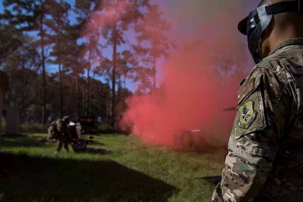 Tech. Sgt. Jose Obregon, 347th Operations Support Squadron Independent Duty Medical Technician NCO in charge of medical operations, observes a student applying Tactical Combat Causality Care during training, Oct. 25, 2017, at Moody Air Force Base, Ga. The new, three-day combined training is designed to merge many smaller courses and seamlessly tie together skills that could be used in the event that Airmen become isolated during a mission. (U.S. Air Force photo by Senior Airman Daniel Snider)