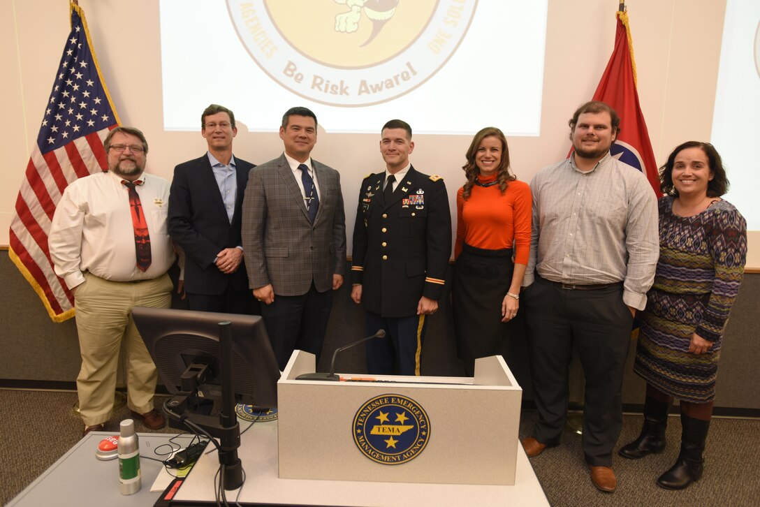 (Left to Right) Doug Worden, Tennessee state hazard mitigation officer; David Owenby, Tennessee deputy commissioner of Administration; Patrick Sheehan, Tennessee Emergency Management Agency director; Lt. Col. Cullen Jones, U.S. Army Corps of Engineers Nashville District commander; Lacy Thomason, Silver Jackets project manager for the Nashville District; Josh Wickham, TEMA Silver Jackets coordinator; and Amy Miller, Tennessee National Flood Insurance Program coordinator; pose during the quarterly Tennessee Silver Jackets meeting with federal, state and local partners at the TEMA Headquarters in Nashville, Tenn., Oct. 31, 2017. They all made presentations during the meeting. (USACE photo by Lee Roberts)