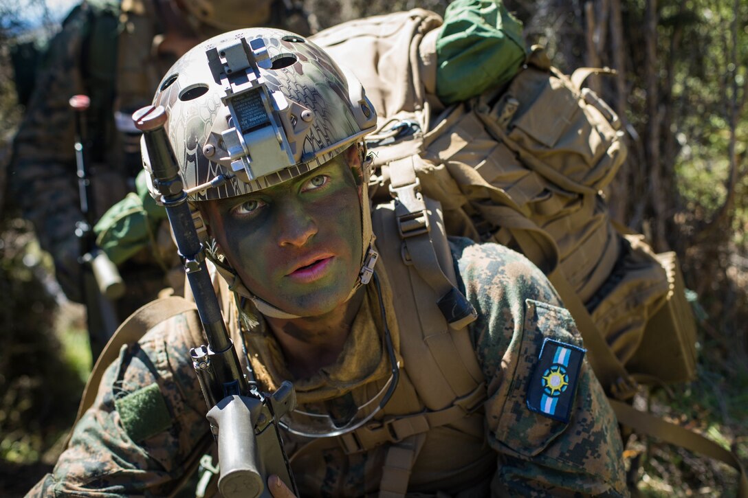 U.S. Marine Corps Lance Cpl. Brendan Mulcahy, a rifleman with 1st Light Armored Reconnaissance Battalion, 1st Marine Division, patrols while extracting from an observation post during Exercise Southern Katipo 17 (SK17), at St. Arnaud, New Zealand, Oct. 28, 2017.