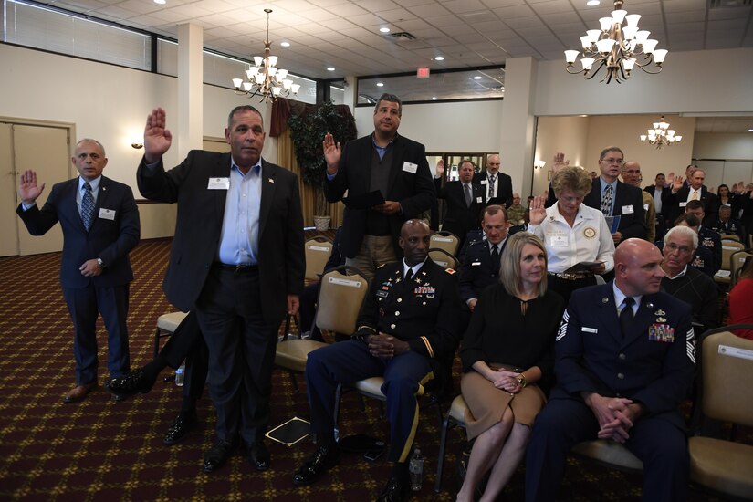 Local community leaders are sworn in as Honorary Commanders during the Honorary Commander Induction Ceremony at Joint Base McGuire-Dix-Lakehurst, N.J., Oct. 30, 2017. The freshly sworn in Honorary Commanders were provided an opportunity to tour Joint Base MDL and witness the diverse mission set here; for some, this was their first time exploring a military installation. (U.S. Air Force photo by Airman 1st Class Zachary Martyn)
