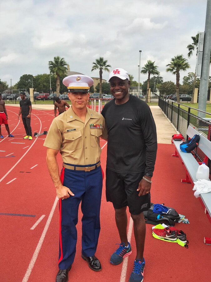 Captain Adam Sanchez, Officer Selection Officer for Officer Selection Station Houston, meets with nine-time Olympic gold medalist Carl Lewis to discuss future leadership possibilities for athletes at the University of Houston, Nov. 1, 2017.