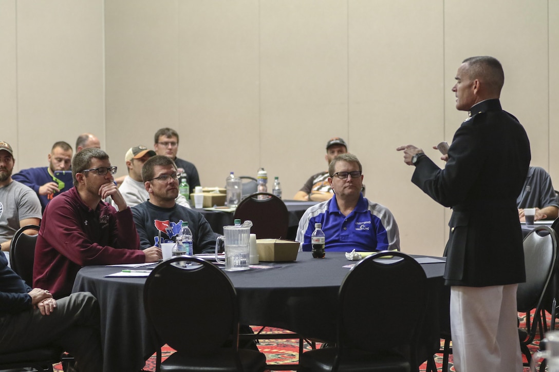Colonel David Fallon, commanding officer, 9th Marine Corps District, Marine Corps Recruiting Command, attended the 33rd Annual Convention of the Iowa Wrestling Coaches and Officials Association as a guest speaker in Des Moines, Iowa, Oct. 29, 2017. (Official Marine Corps photo by Sgt. Levi Schultz)