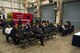The audience waits for the signing of the memorandum of agreement in Goodfellow’s firetruck maintenance facility on Goodfellow Air Force Base, Texas, Oct. 31, 2017. The agreement is a reaffirmation between San Angelo and Goodfellow, stating that the base will perform maintenance on the city’s firetruck fleet when needed, and in exchange they provide first response ambulances. (U.S. Air Force photo by Senior Airman Scott Jackson/Released)