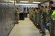 U.S. Airmen assigned to the 20th Fighter Wing stand for roll call before trick-or-treating at Shaw Air Force Base, South Carolina, Oct. 31, 2017.