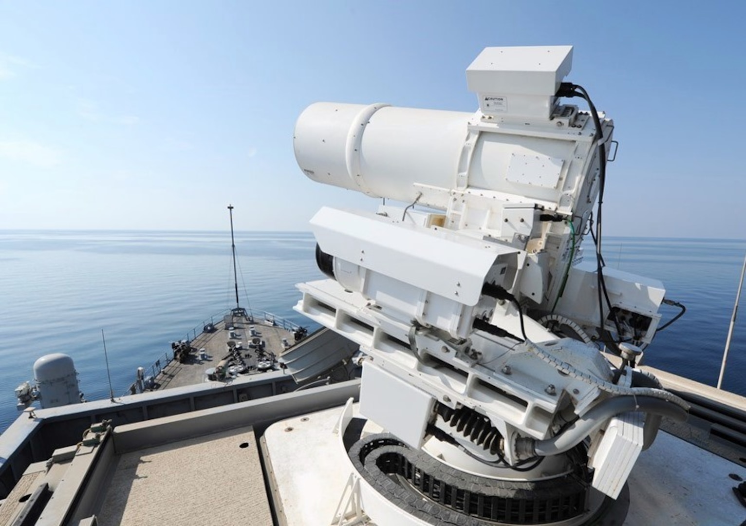 IMAGE: 141117-N-PO203-072 
ARABIAN GULF (Nov. 17, 2014) The Afloat Forward Staging Base (Interim) USS Ponce (ASB(I) 15) conducts an operational demonstration of the Office of Naval Research (ONR)-sponsored Laser Weapon System (LaWS) while deployed to the Arabian Gulf. (U.S. Navy photo by John F. Williams/Released)