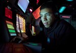 IMAGE: 170130-N-PP996-057 (Jan. 30, 2017) Cryptologic Technician (Technical) 2nd Class Jonathan Morel, from Salem, Massachusetts, uses a radar tracking system to track surface contacts aboard Arleigh Burke-class guided-missile destroyer USS Michael Murphy (DDG 112). Michael Murphy is on a regularly scheduled Western Pacific deployment with the Carl Vinson Carrier Strike Group as part of the U.S. Pacific Fleet-led initiative to extend the command and control functions of U.S. 3rd Fleet. U.S. Navy aircraft carrier strike groups have patrolled the Indo-Asia-Pacific regularly and routinely for more than 70 years. (U.S. Navy photo by Mass Communication Specialist 3rd Class Danny Kelley/Released)